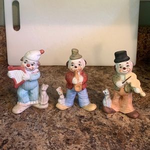 Clown Trio playing instruments